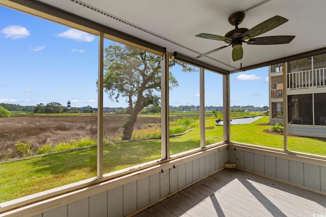 4520 Coquina Harbour Dr Unit F-3, Little River, SC 29566 - unfurnished sunroom featuring a water view and a ceiling fan