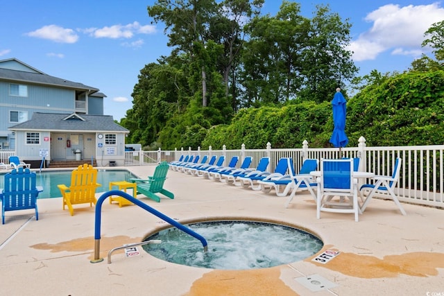 4520 Coquina Harbour Dr Unit F-3, Little River, SC 29566 - community pool featuring a patio and a hot tub