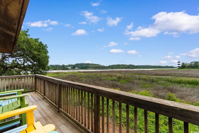 4520 Coquina Harbour Dr Unit F-3, Little River, SC 29566 - wooden terrace featuring a view of countryside