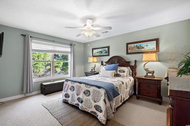 9679 Stillwater Ct, Myrtle Beach, SC 29572 - bedroom featuring light colored carpet, baseboards, a ceiling fan, and a textured ceiling