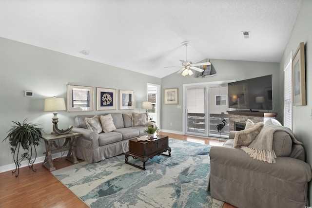 9679 Stillwater Ct, Myrtle Beach, SC 29572 - living room with wood finished floors, vaulted ceiling, a ceiling fan, and baseboards