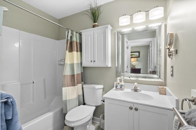 full bathroom with toilet, vanity, and shower / bath combo with shower curtain