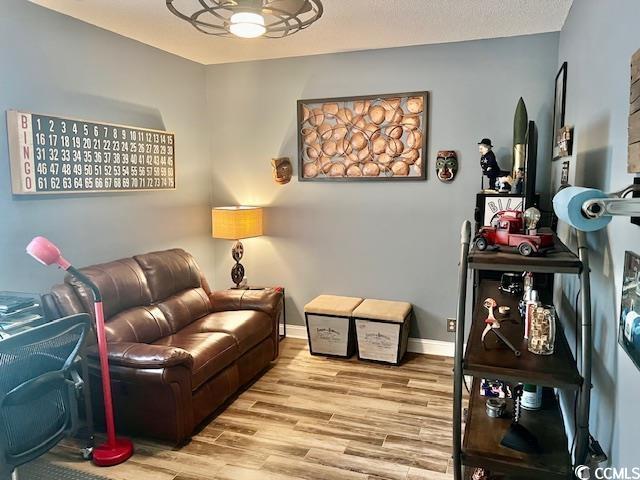 1504 Saint Thomas Cir, Myrtle Beach, SC 29577 - living area with wood finished floors and baseboards