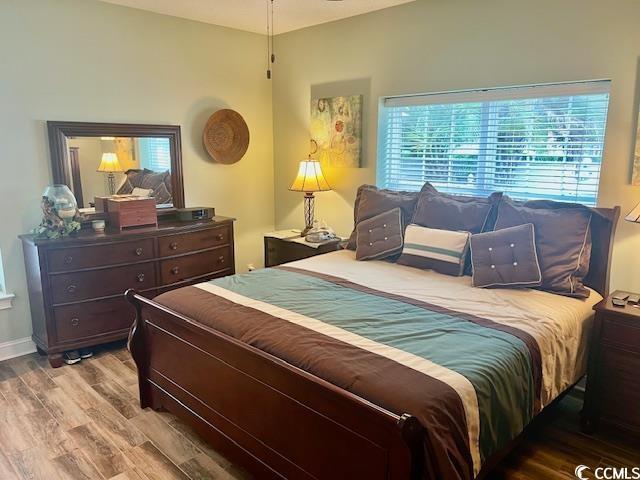 1504 Saint Thomas Cir, Myrtle Beach, SC 29577 - bedroom featuring wood finished floors and baseboards