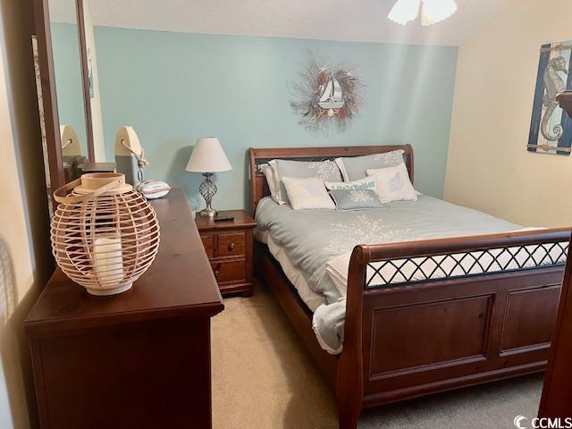1504 Saint Thomas Cir, Myrtle Beach, SC 29577 - bedroom with light carpet and a ceiling fan