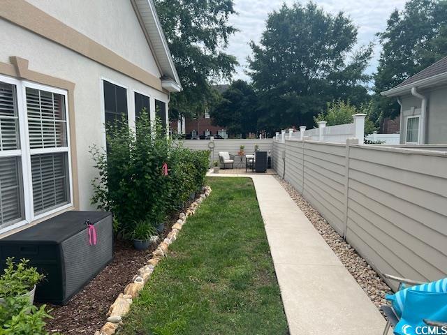 1504 Saint Thomas Cir, Myrtle Beach, SC 29577 - view of yard featuring a patio