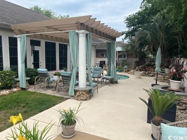 1504 Saint Thomas Cir, Myrtle Beach, SC 29577 - view of patio with a pergola