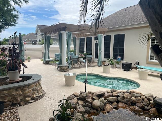 1504 Saint Thomas Cir, Myrtle Beach, SC 29577 - view of pool with a patio area and a pergola