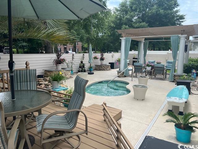1504 Saint Thomas Cir, Myrtle Beach, SC 29577 - view of pool with a fenced backyard, outdoor dining area, a patio, a pool, and a pergola