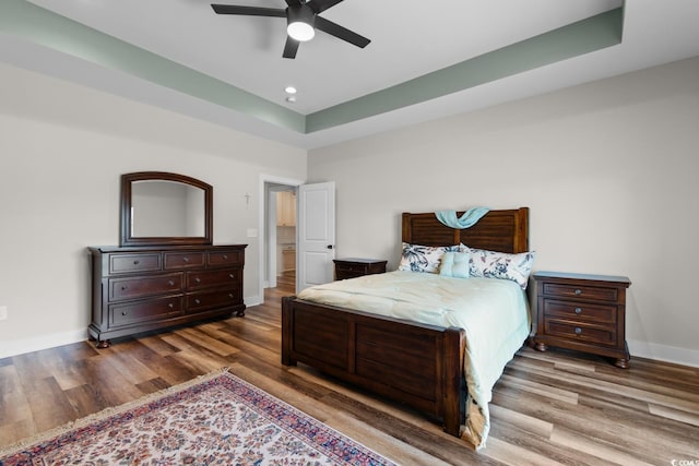2505 Suzanne Dr, Conway, SC 29526 - bedroom featuring wood finished floors, baseboards, recessed lighting, a tray ceiling, and a ceiling fan