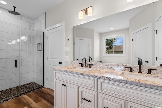 2505 Suzanne Dr, Conway, SC 29526 - full bath featuring wood finished floors, a stall shower, double vanity, and recessed lighting