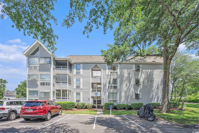 351 Lake Arrowhead Rd Unit 24-396, Myrtle Beach, SC 29572 - view of building exterior with uncovered parking