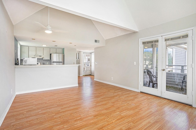 351 Lake Arrowhead Rd Unit 24-396, Myrtle Beach, SC 29572 - unfurnished living room featuring a ceiling fan, plenty of natural light, light wood-style floors, french doors, and high vaulted ceiling