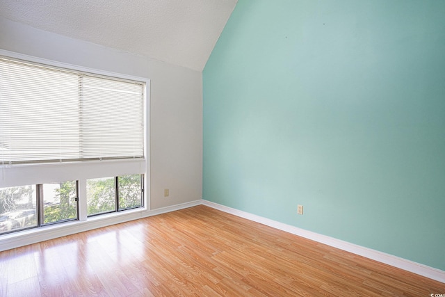 351 Lake Arrowhead Rd Unit 24-396, Myrtle Beach, SC 29572 - unfurnished room featuring vaulted ceiling and light wood-style floors