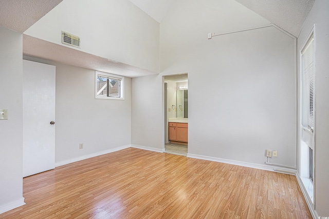 351 Lake Arrowhead Rd Unit 24-396, Myrtle Beach, SC 29572 - unfurnished bedroom with light wood finished floors and lofted ceiling