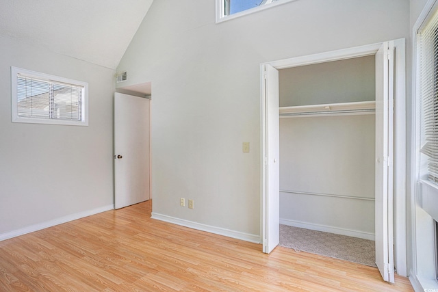 351 Lake Arrowhead Rd Unit 24-396, Myrtle Beach, SC 29572 - unfurnished bedroom with wood finished floors, a closet, and high vaulted ceiling