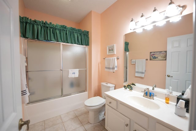 170 Glenwood Dr, Conway, SC 29526 - bathroom featuring vanity, combined bath / shower with glass door, tile patterned floors, and a textured ceiling