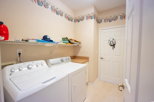 laundry area with washer and dryer