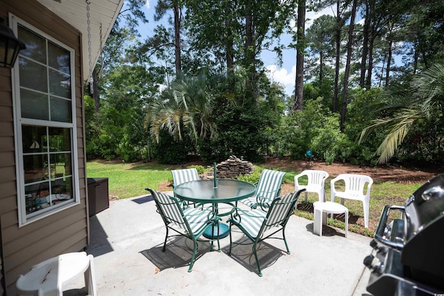 view of patio featuring outdoor dining space and area for grilling