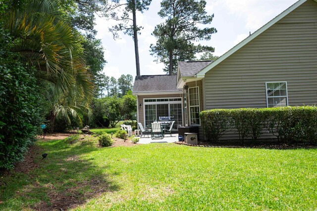 170 Glenwood Dr, Conway, SC 29526 - view of grassy yard featuring a patio