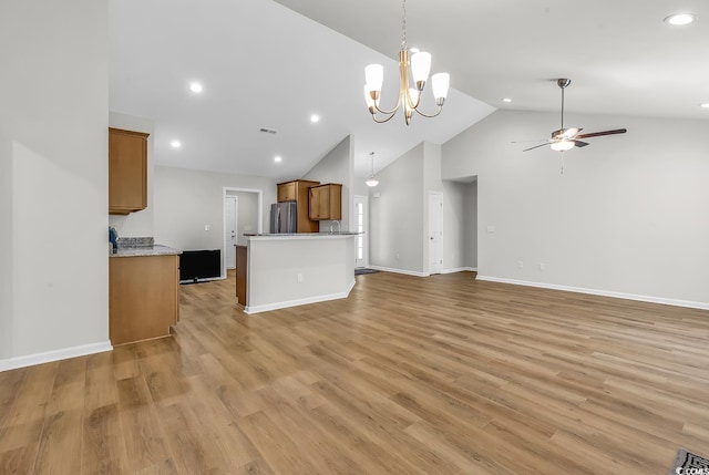 unfurnished living room with ceiling fan, high vaulted ceiling, recessed lighting, light wood-type flooring, and baseboards