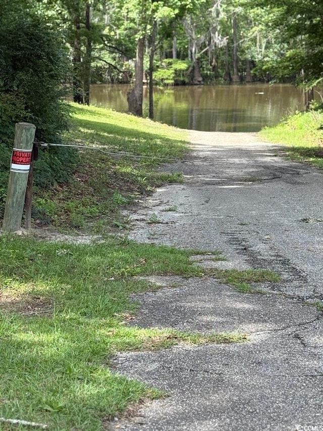view of road featuring a water view