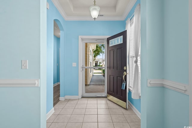 6244 Catalina Dr Unit 511, North Myrtle Beach, SC 29582 - foyer entrance featuring baseboards, arched walkways, light tile patterned flooring, and a raised ceiling