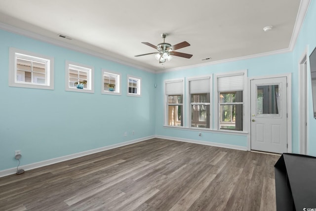 6244 Catalina Dr Unit 511, North Myrtle Beach, SC 29582 - empty room with crown molding, ceiling fan, dark wood-type flooring, baseboards, and a smoke detector