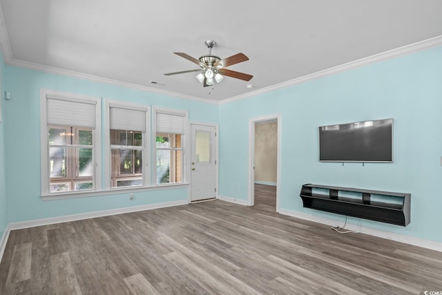 6244 Catalina Dr Unit 511, North Myrtle Beach, SC 29582 - unfurnished living room featuring a ceiling fan, ornamental molding, baseboards, and wood finished floors
