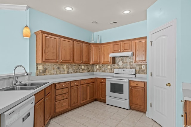 6244 Catalina Dr Unit 511, North Myrtle Beach, SC 29582 - kitchen with white appliances, a sink, under cabinet range hood, and tasteful backsplash