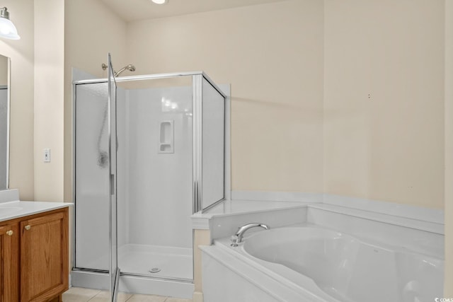 6244 Catalina Dr Unit 511, North Myrtle Beach, SC 29582 - full bathroom featuring a shower stall, a bath, tile patterned floors, and vanity