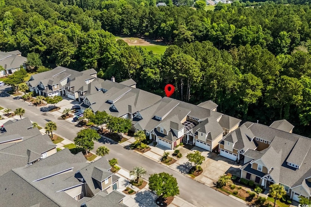 6244 Catalina Dr Unit 511, North Myrtle Beach, SC 29582 - aerial perspective of suburban area with a forest