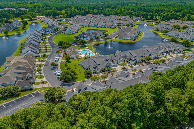 6244 Catalina Dr Unit 511, North Myrtle Beach, SC 29582 - aerial view of residential area with a heavily wooded area and a nearby body of water