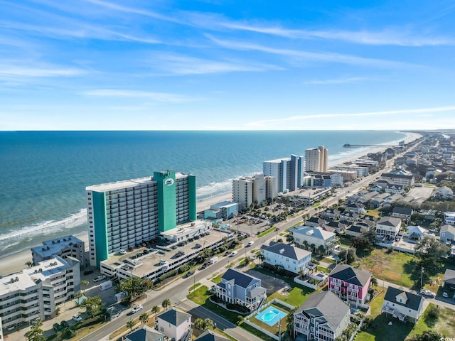 bird's eye view of waterfront with a beach