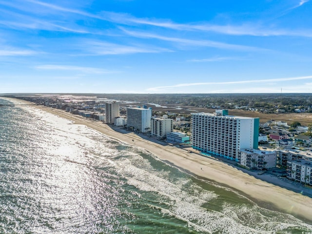 drone / aerial view of waterfront with a beach