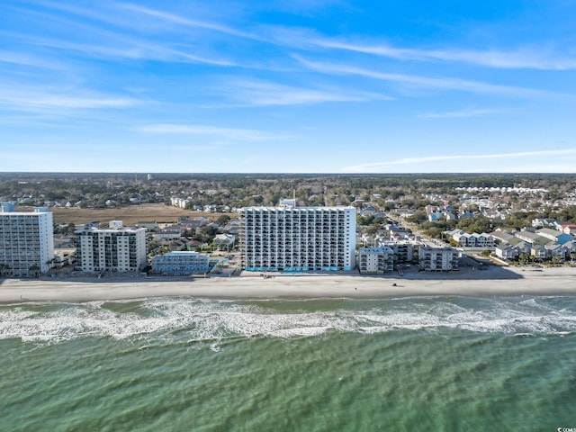 bird's eye view of waterfront with a beach