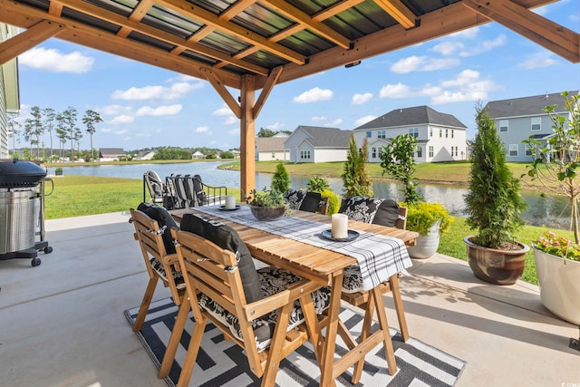 122 New Paradise Way, Myrtle Beach, SC 29588 - view of patio featuring a water view, a residential view, outdoor dining area, and area for grilling