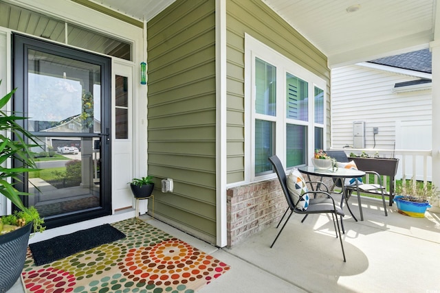122 New Paradise Way, Myrtle Beach, SC 29588 - entrance to property featuring covered porch and brick siding