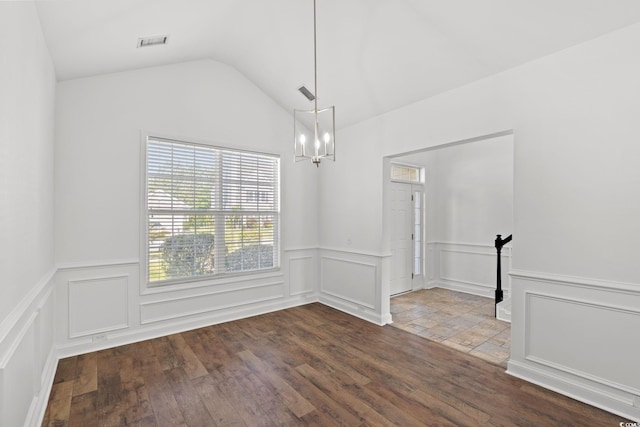 5146 Fairmont Ln, Myrtle Beach, SC 29579 - spare room with a chandelier, dark wood-style floors, a wainscoted wall, a decorative wall, and vaulted ceiling