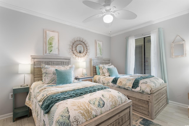 307 74th Ave N Unit 3C, Myrtle Beach, SC 29572 - bedroom with baseboards, crown molding, wood finished floors, and ceiling fan