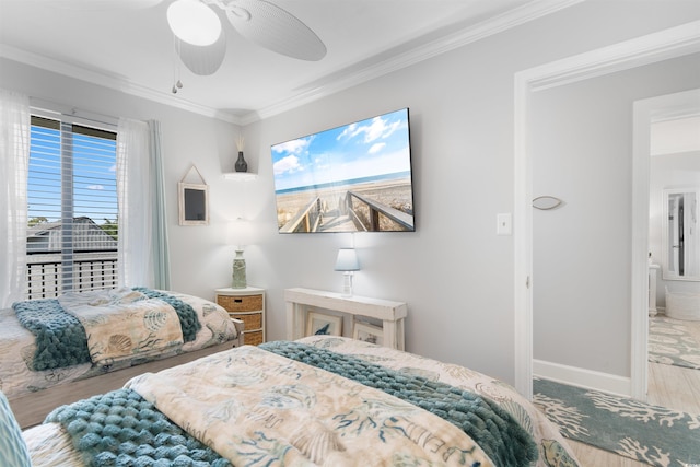 307 74th Ave N Unit 3C, Myrtle Beach, SC 29572 - bedroom with crown molding, wood finished floors, baseboards, and ceiling fan