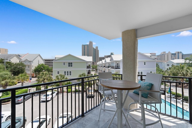 307 74th Ave N Unit 3C, Myrtle Beach, SC 29572 - balcony with a residential view and view of pool