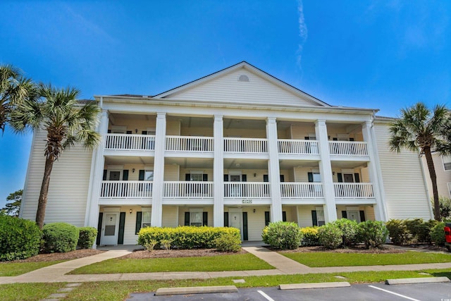 4940 Windsor Green Way Unit 301, Myrtle Beach, SC 29579 - view of property featuring uncovered parking
