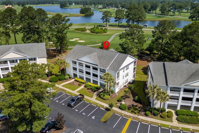 4940 Windsor Green Way Unit 301, Myrtle Beach, SC 29579 - bird's eye view of a nearby body of water, a local golf course, and a tree filled landscape