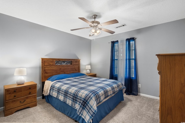 4940 Windsor Green Way Unit 301, Myrtle Beach, SC 29579 - bedroom featuring carpet floors, baseboards, a ceiling fan, and a textured ceiling