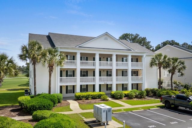 4940 Windsor Green Way Unit 301, Myrtle Beach, SC 29579 - view of building exterior featuring uncovered parking