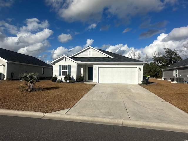 198 Foxford Dr, Conway, SC 29526 - single story home featuring concrete driveway, an attached garage, central AC unit, and a front lawn