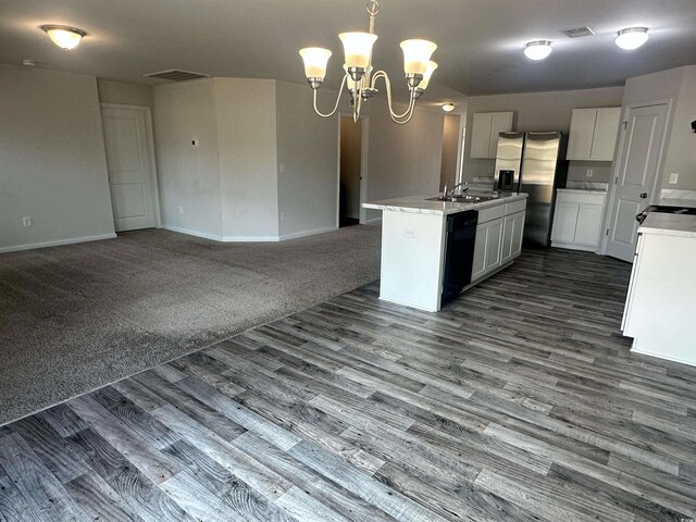 198 Foxford Dr, Conway, SC 29526 - kitchen featuring black dishwasher, open floor plan, a sink, and white cabinets