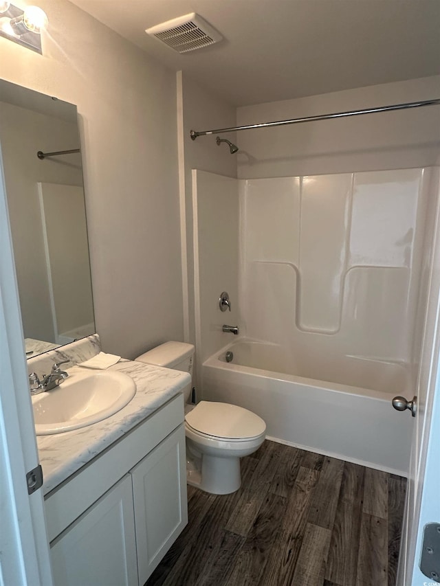 198 Foxford Dr, Conway, SC 29526 - full bath with wood finished floors, toilet, vanity, and washtub / shower combination