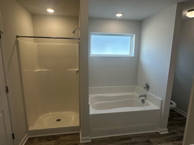 198 Foxford Dr, Conway, SC 29526 - bathroom with a shower, toilet, wood finished floors, a garden tub, and baseboards